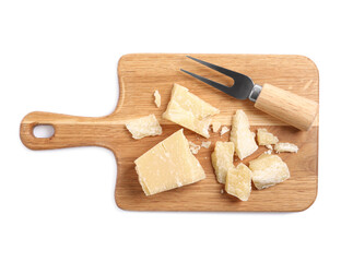 Parmesan cheese with fork and wooden board on white background, top view