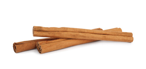 Aromatic dry cinnamon sticks on white background