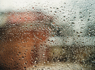 raindrops on glass and street view