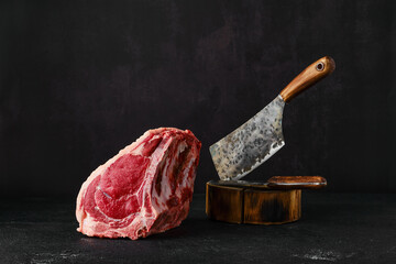 Raw rib-eye steak bone in
