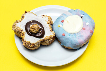 Various donuts on yellow background