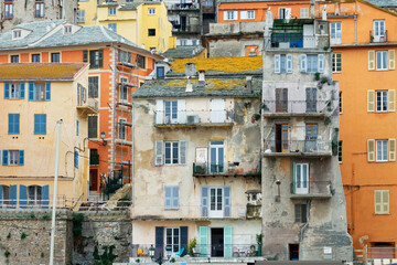 Fototapeta na wymiar Old buildings in the old port of Bastia, Corsica