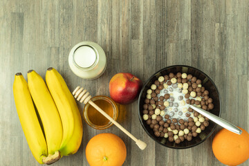 Round flakes in chocolate with milk and honey