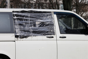 sealed broken window in a white car