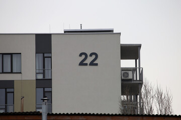 Digit 22 on the wall of the house