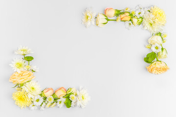 Creative layout composition of flowers on pastel background.