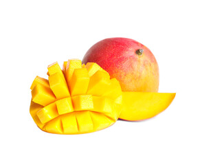 Delicious whole and cut mangoes on white background