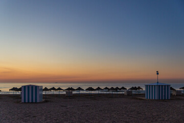 Fototapeta premium sunrise with beautiful colors at malvarosa beach of the City of valencia, costa blanca, spain