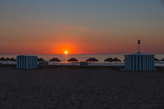 sunrise with beautiful colors at malvarosa beach of the City of valencia, costa blanca, spain