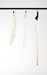 Elegant and trendy women's clothes hanging
