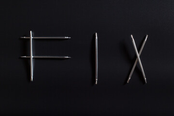 Word fix made of screwdrivers. Tools for reparing small electronics.