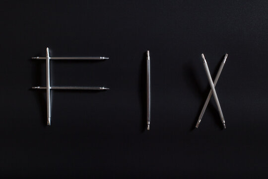 Word fix made of screwdrivers. Tools for reparing small electronics.