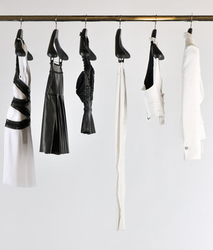 Elegant and trendy women's clothes hanging