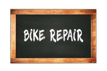 Obraz premium BIKE REPAIR text written on wooden frame school blackboard.