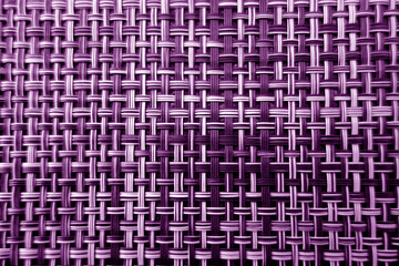 Pattern of plastic tablecloth with blur effect in purple tone.