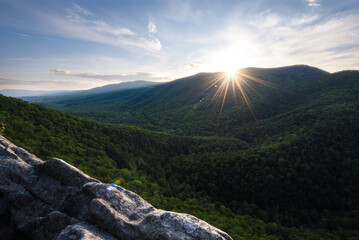 Late afternoon at Buzzard Rock as the sun sets behind the Blue Ridge Mountains.