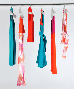 Elegant and trendy women's clothes hanging