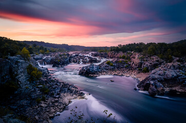 A vibrant late Summer sunset over Great Falls Park outside of Washington DC