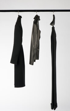 Elegant and trendy women's clothes hanging