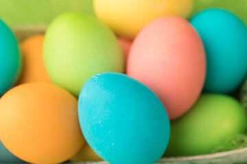 Colorful chicken eggs are painted for the Easter holiday.