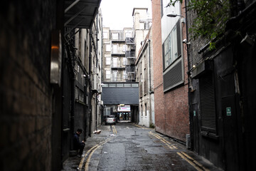 Fototapeta premium Dark and rainy alley in Dublin, Ireland.