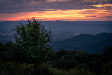 A simple sunset from an overlook along Skyline Drive in Shenandoah National Park looking out across the Shenandoah Valley.