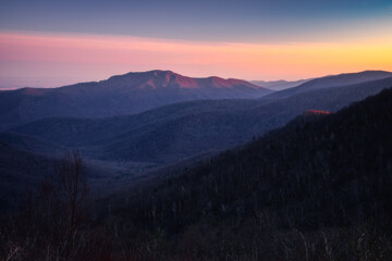 Fototapeta na wymiar Sunset glow atop Old Rag Mountain in Shenandoah National Park.