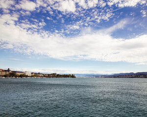 Panoramic view of historic Zurich city center with famous Opera House at Lake Zurich on a sunny day with clouds in summer, Canton of Zurich, Switzerland