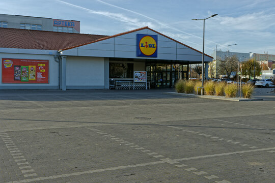 Empty parking lot in front of Lidl store. Supermarket closed for Sunday. Belchatow, Poland - November 15, 2020.