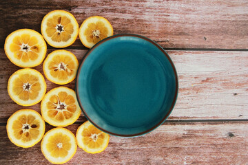 blue decorative plate and round orange slices