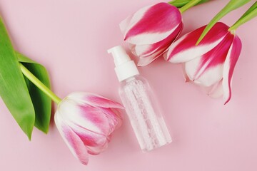 pink tulips with olastic bottle