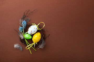 Easter composition with a decorative nest and eggs