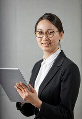 businesswoman with tablet and file