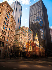 Fototapeta na wymiar Sunbeam Reflections on Old State House and Historic Downtown Buildings in Boston
