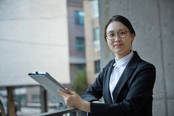 businesswoman holding files