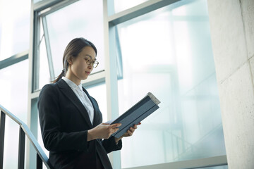 Businesswoman in the hallway