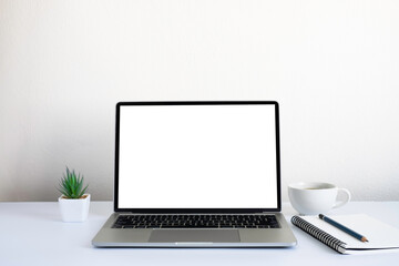 Fototapeta premium White office desk table with keyboard of laptop, coffee cup and notebook, mouse computer with equipment office supplies. Business and finance concept. Workplace, Flat lay with blank copy space.