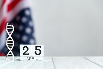 The worlds DNA day, April 25 calendar on the US flag background