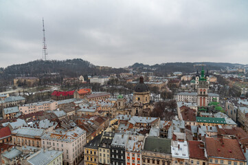 Fototapeta na wymiar Lviv bird's-eye view of from of the City Hall Ratusha. General view from the roof. View from the roof of the City Hall Lvov cityscape.