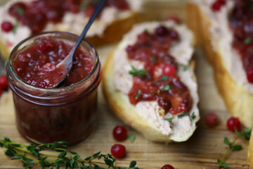 Toast with pate and cranberry jam. Goose pate toast.