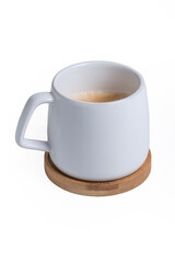 white cup with coffee on a wooden stand. Isolated.