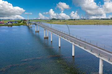 Fototapeta premium Aerial view with pedestrian bridge over the Wangermeer near Hohenkirchen