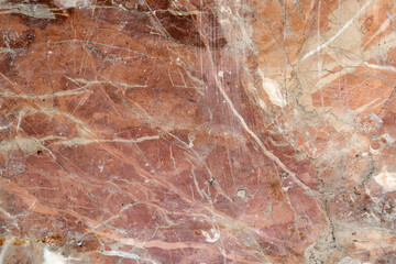 Background texture of a beautiful red and brown marble stone