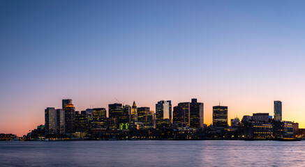 Fototapeta na wymiar Panoramic Night Cityscape Boston Skyline over Mystic River in Boston