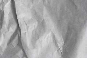Crumpled gray craft paper background texture