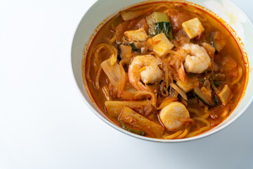 Spicy Korean-style noodle with vegetables and seafood.