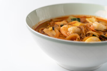 Spicy Korean-style noodle with vegetables and seafood.
