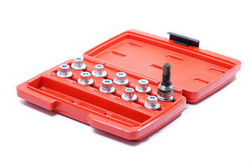 A set of sockets for wheel locks are in a red box. The extractor is in a box among the wheel locks.