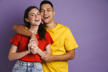 Naklejka premium Happy beautiful couple hugging and holding hands