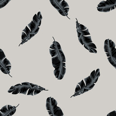 Seamless pattern with hand drawn stylized banana palm leaves